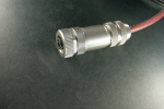 Female connector shielded with armored wire